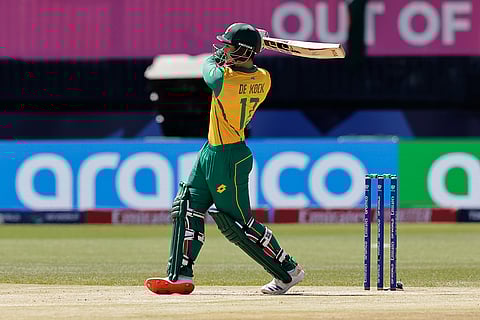 Quinton de Kock plays a shot against Bangladesh